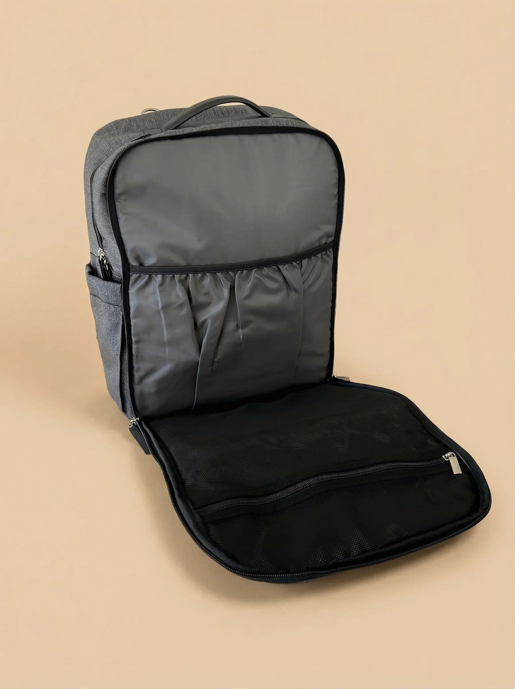 Bebefit Travel Bag open on beige background with organized compartments, bebefit.eu