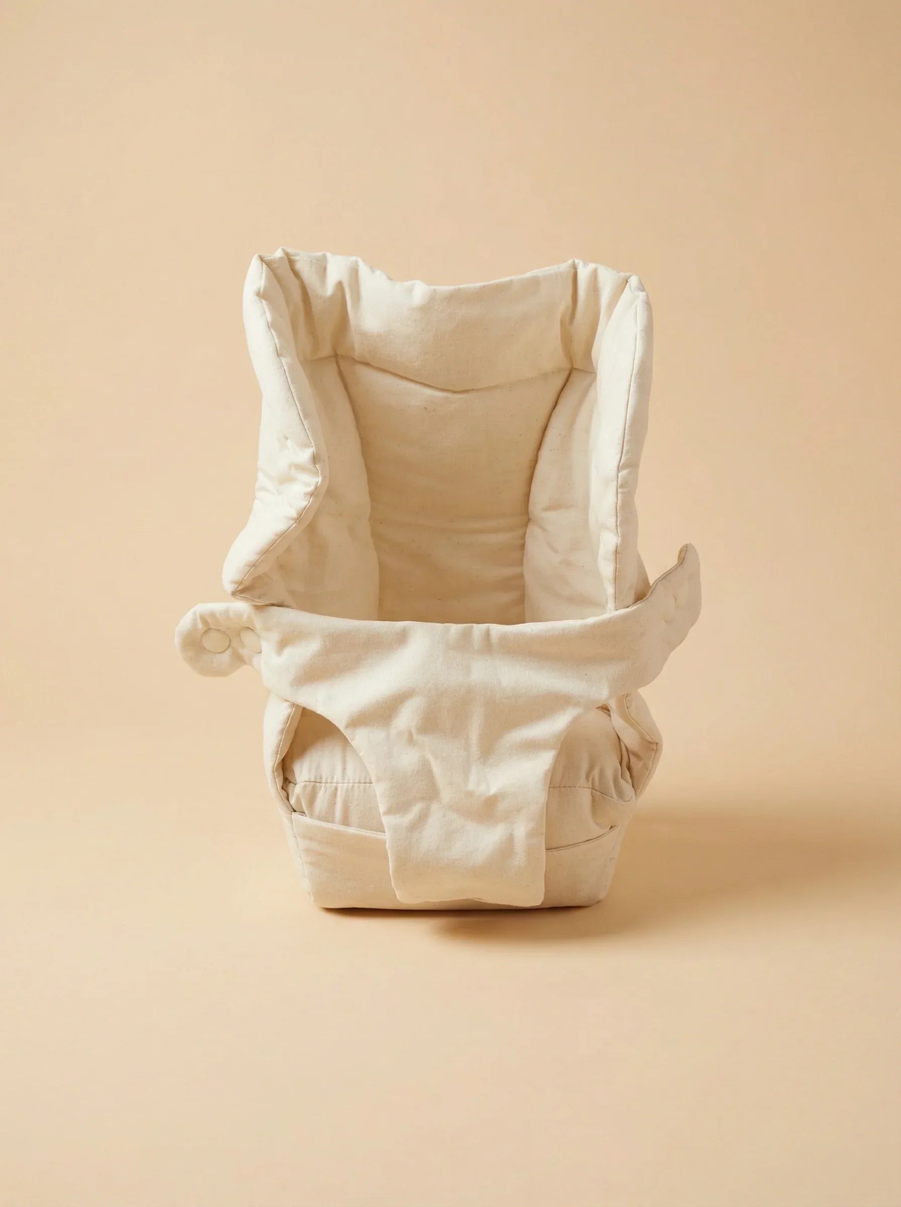 Bebefit Premium Baby Carrier Insert in beige, ergonomic newborn support on bebefit.eu