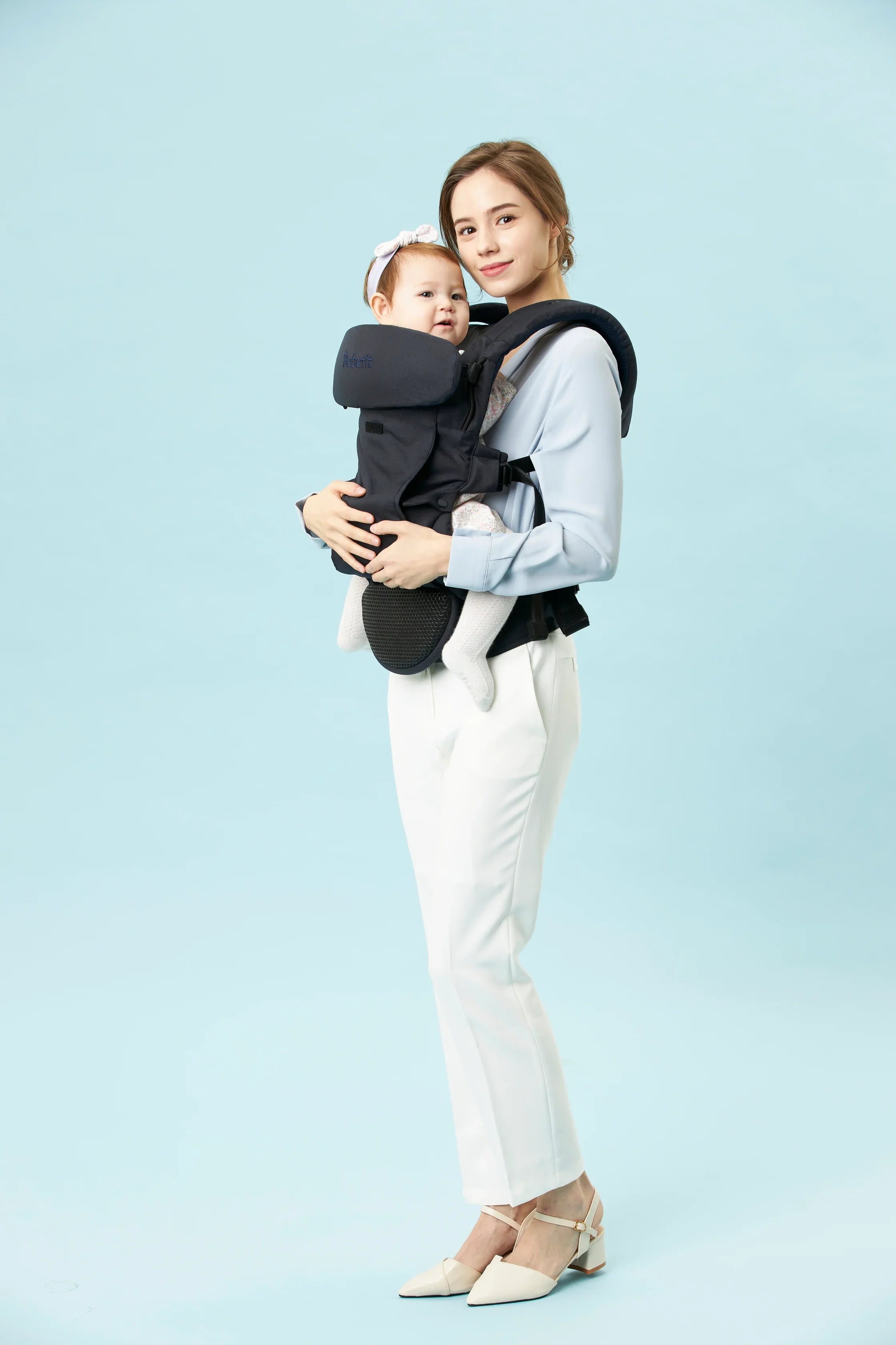 Mother carrying baby in ergonomic baby carrier, bebefit.eu, Premium Ergonomic Baby Carrier