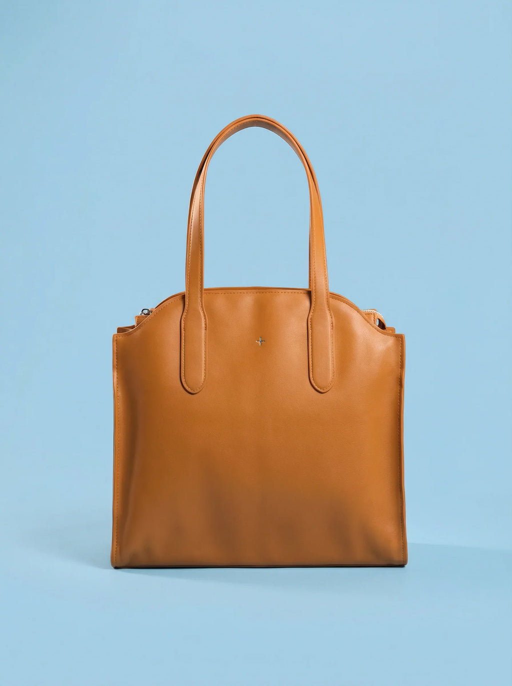 bebefit.eu Brown leather tote bag, product title, with double handles on blue background
