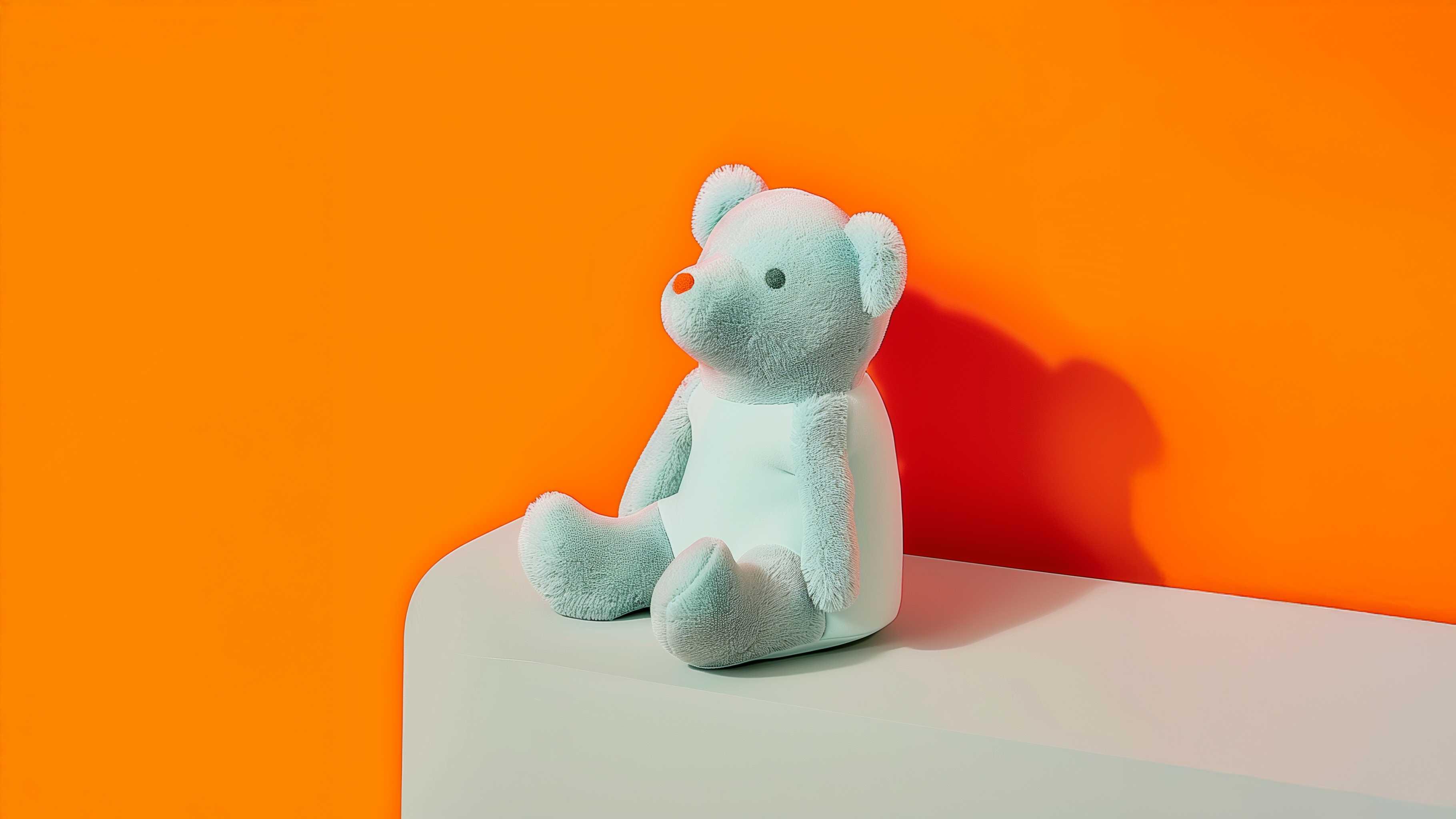 bebefit.eu Baby Toddler Bold plush teddy bear on white table with orange background